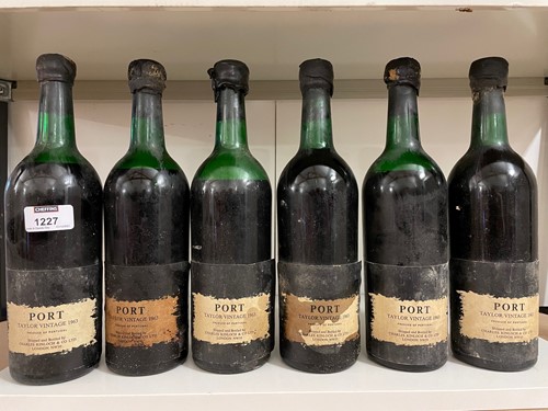 Lot 1227 - Taylor's vintage port 1963, 6 bottles, varying...