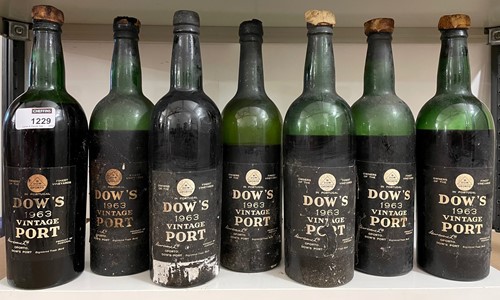 Lot 1229 - Dow's vintage port 1963, 7 bottles, damaged...