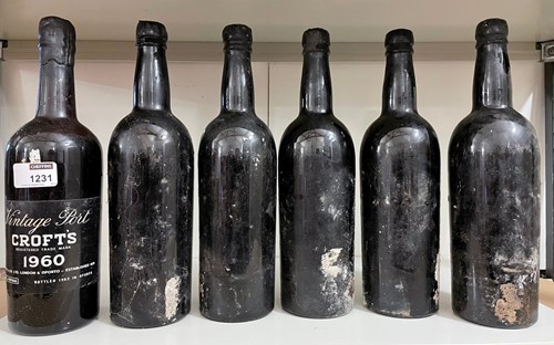 Lot 1231 - Croft vintage port 1960, 11 bottles, chipped...