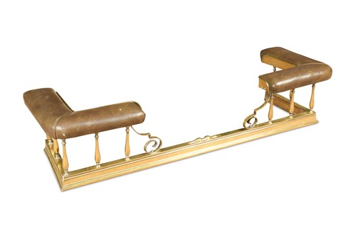 Lot 597 - A brass club fender, late 19th century
