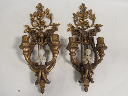 Lot 549 - A pair of Neoclassical style gilt sconces with...