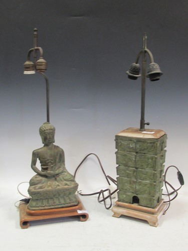Lot 211 - A Bronze lamp base cast as an ancient Chinese...