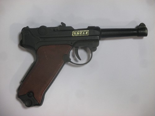 Lot 146 - A Luger Toy pistol from the comic/movie MAN...