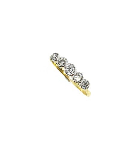 Lot 91 - A five stone diamond half hoop style ring