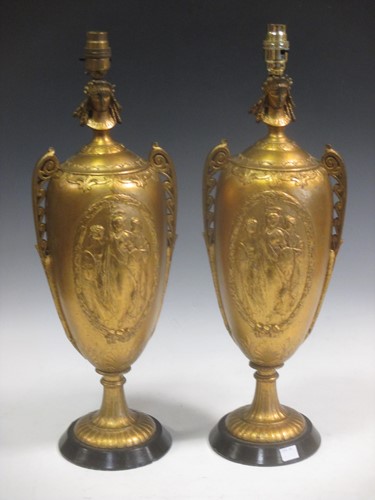 Lot 41 - A pair of early 20th century gold coloured...