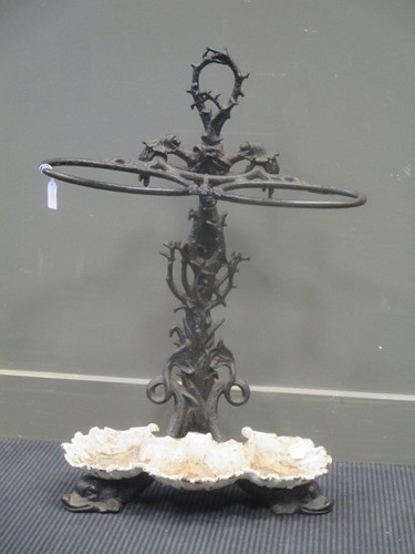 Lot 585 - A Victorian black painted cast iron stick...