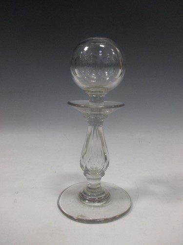 Lot 29 - A 19th century glass lace maker's lamp, the...