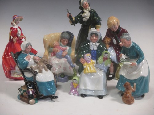 Lot 72 - Seven Doulton figures to include: The Rag Doll...