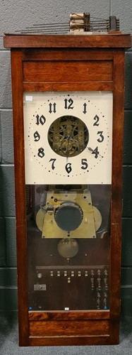 Lot 240 - McClintock Company chiming master clock,...