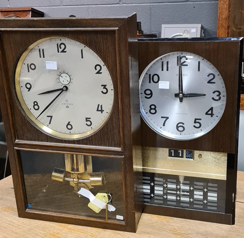 Lot 247 - ATO by Junghans electric wall clock, 47cm high,...