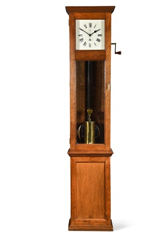 Lot 383 - Magneta of London electric master oak longcase clock,  circa 1930
