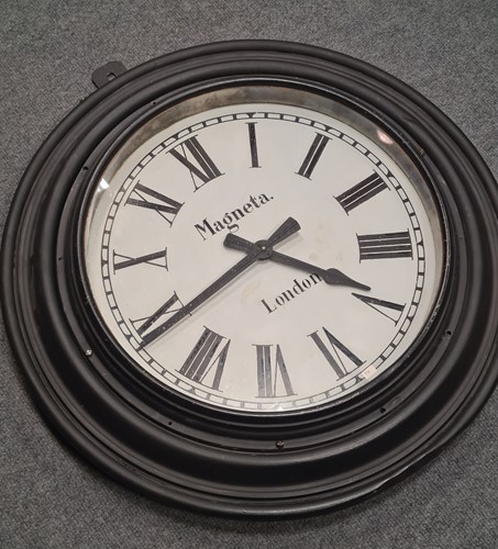 Lot 280 - Magneta London slave clock, black painted...