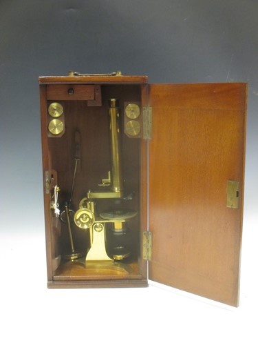 Lot 154 - A Baker of London lacquered brass monocular...