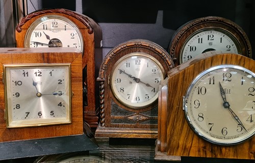 Lot 300 - Five Bulle electric mantel clocks, in varying...