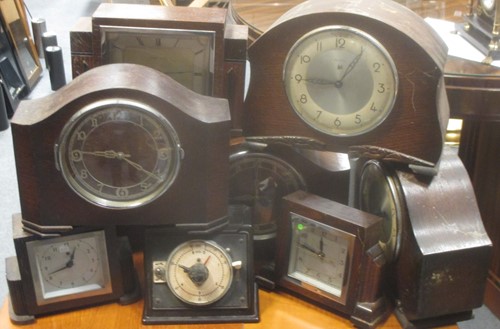 Lot 146 - Eight various electric mantel clocks c.1930s,...