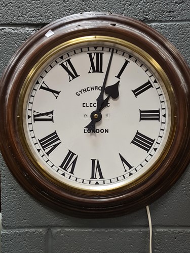 Lot 367 - A pre-WWI enamelled Synchronome slave clock,...