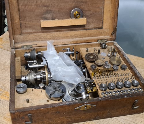 Lot 313 - A 6mm watchmaker's lathe, with many fittings,...