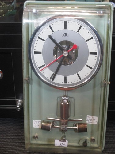 Lot 374 - ATO mid-century perpsex covered wall clock...