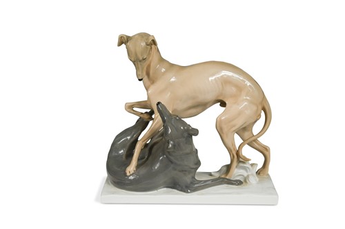 Lot 73 - Otto Pilz (1876-1934) for Meissen, a porcelain model of two playful greyhounds