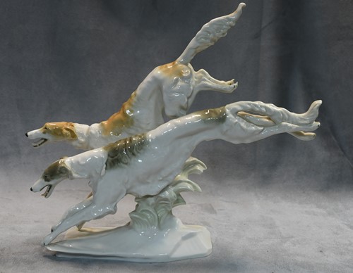 Lot 75 - Karl Tutter for Hutschenreuther, a brace of running Borzoi