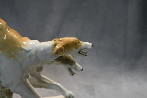 Lot 75 - Karl Tutter for Hutschenreuther, a brace of running Borzoi