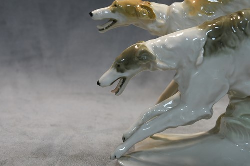 Lot 75 - Karl Tutter for Hutschenreuther, a brace of running Borzoi