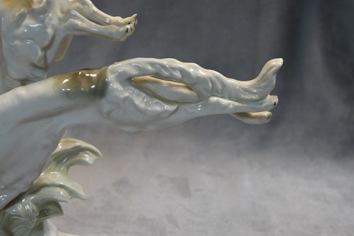 Lot 75 - Karl Tutter for Hutschenreuther, a brace of running Borzoi