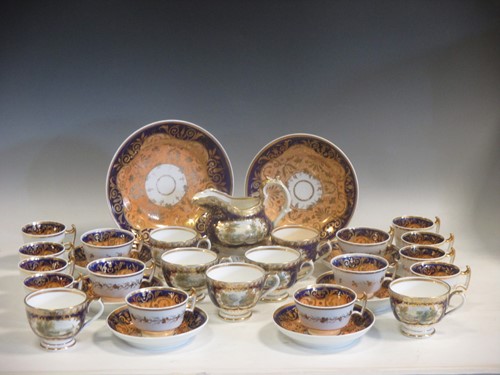 Lot 69 - A blue and gilt painted tea service