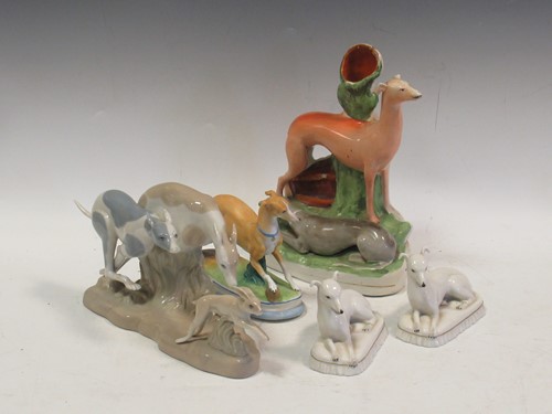 Lot 153 - A Staffordshire model of two Greyhounds, a...