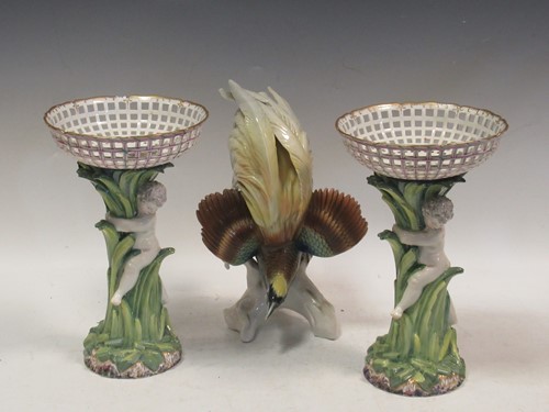 Lot 122 - A pair of Berlin porcelain figural tazze...
