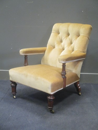Lot 667 - A late Victorian easy chair by Gillow, stamped...