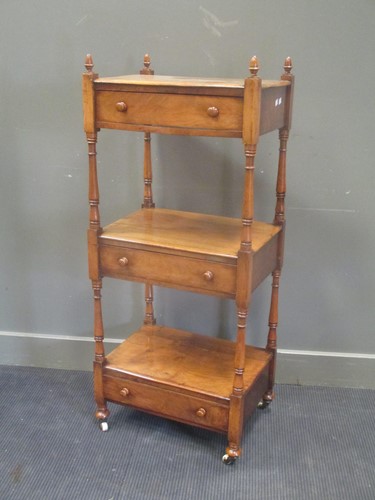 Lot 668 - A Victorian style three-tier walnut etagere,...