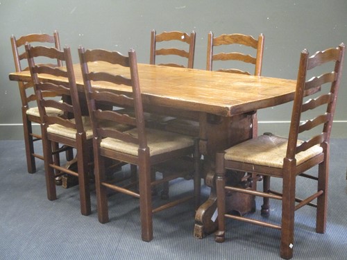 Lot 670 - A 20th century oak refectory dining table, 76...