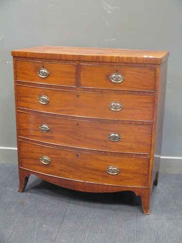 Lot 671 - A 19th century mahogany bow front chest of...