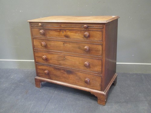 Lot 660 - A George III mahogany chest of drawers with...