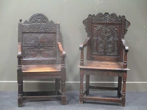 Lot 658 - Two similar 17th century style carved oak...