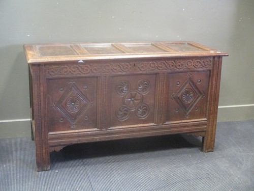 Lot 657 - A 17th century oak coffer, 139cm wide