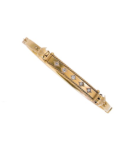 Lot 236 - A 15ct gold Victorian diamond set hinged bangle