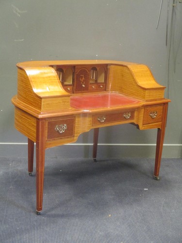 Lot 532 - A 20th century satinwood Carlton House desk,...