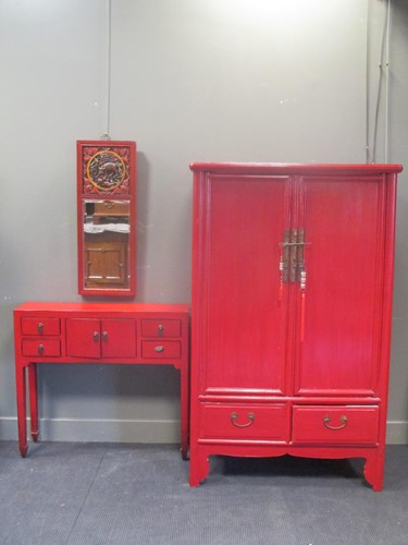 Lot 540 - A red painted Chinese bedroom suit to include...