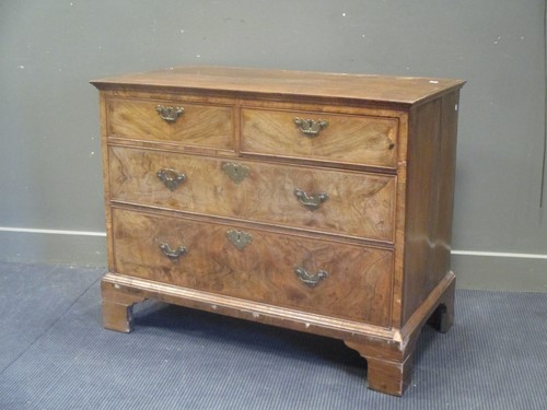 Lot 685 - An 18th century and later walnut chest of...