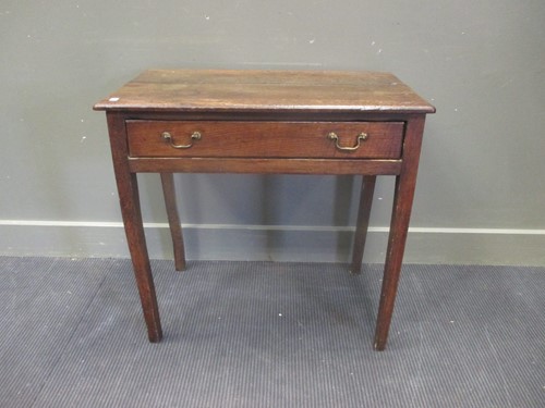 Lot 693 - A Georgian oak side table with a single drawer,...