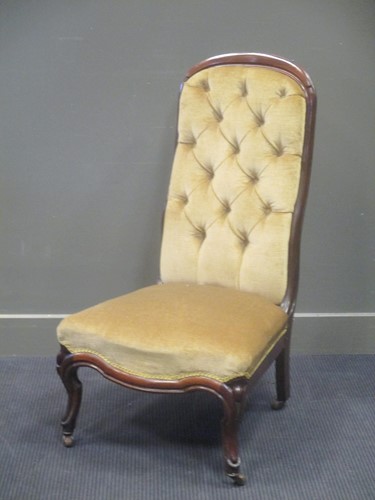 Lot 558 - A Victorian rosewood nursing chair