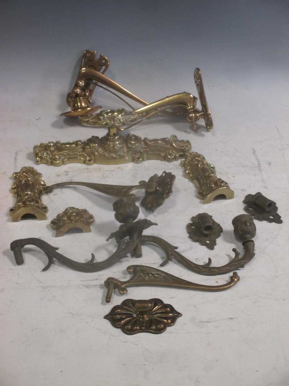 Lot 137 - A collection of various salvaged coat hooks,...