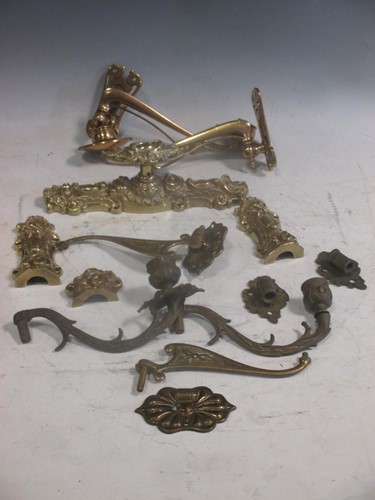 Lot 137 - A collection of various salvaged coat hooks,...