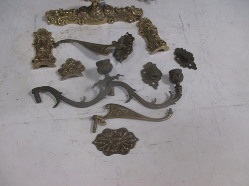 Lot 137 - A collection of various salvaged coat hooks,...