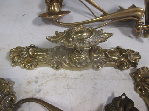 Lot 137 - A collection of various salvaged coat hooks,...