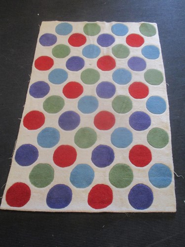 Lot 736 - A modern wool rug, the white ground decorated...