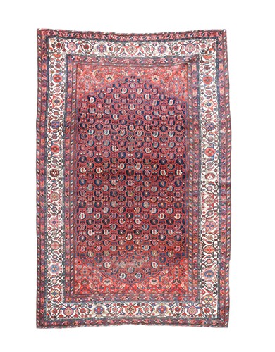 Lot 397 - A red ground Feraghan carpet