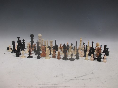 Lot 151 - A large quantity of various chess pieces